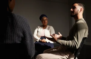 Man participating in a mental health training session, reflecting modern security guard training trends.