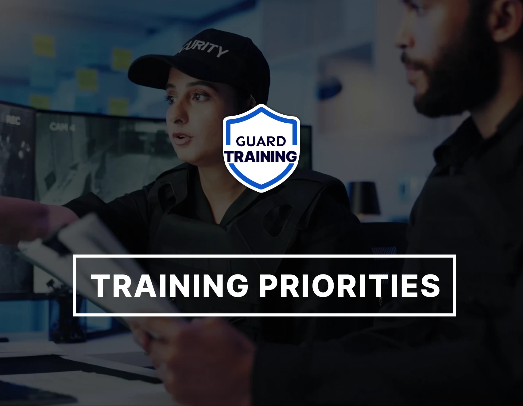 Female security officer reviewing live CCTV footage during online guard training at a security operations center