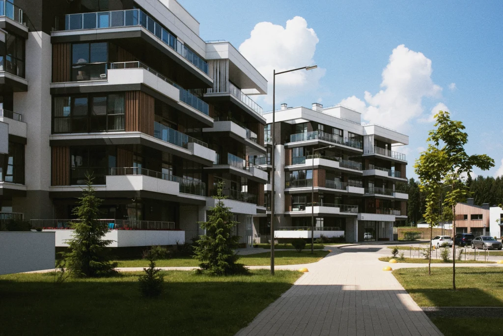 Modern residential apartment community with landscaped grounds